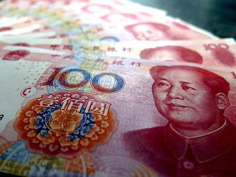 Западные СМИ: юань теснит доллар, который теряет свой международный статус